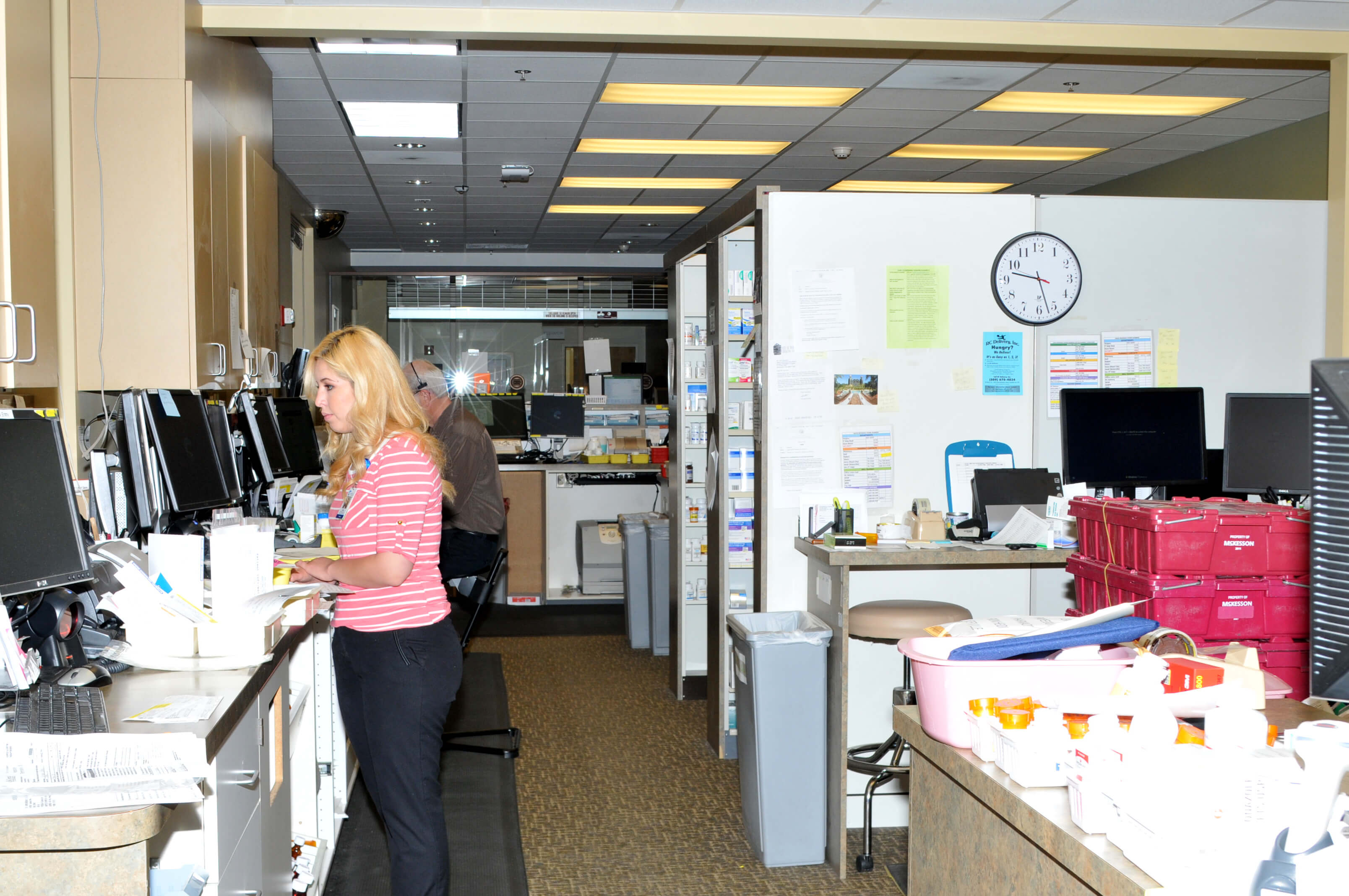 woman in pharmacy office